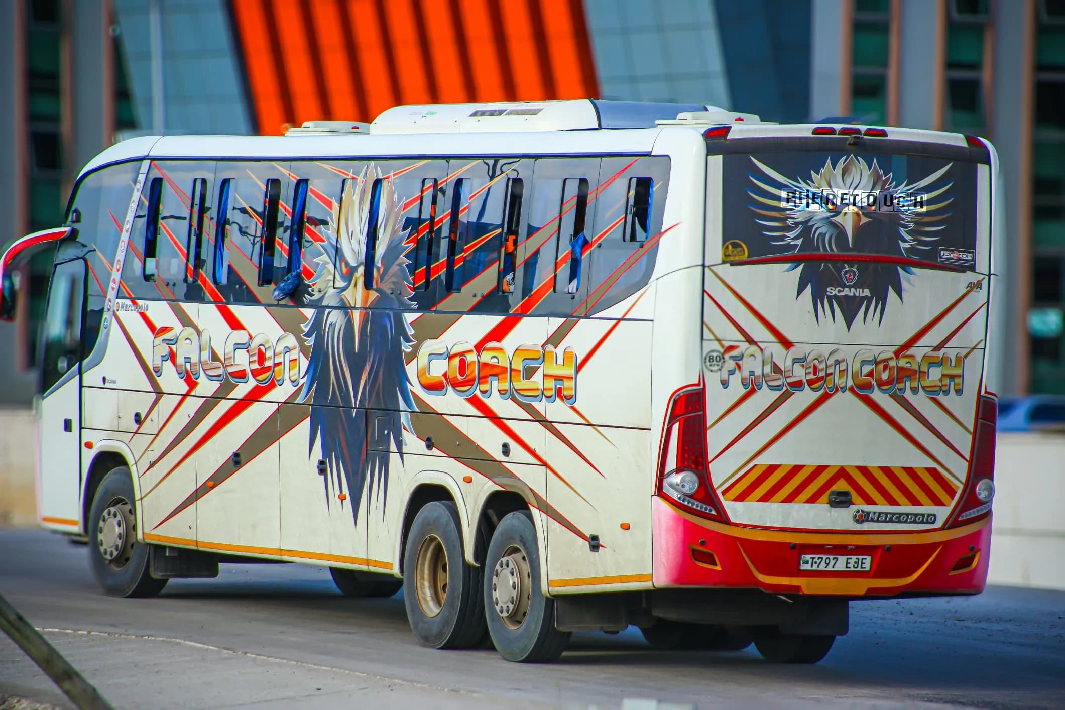 Woman next to a bus